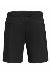 Short noir à taille élastique, coupe droite, sans logos ni motifs visibles, vu de dos.