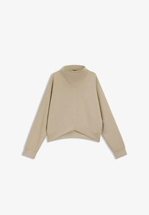 Beige cropped sweatshirt with a high V-neckline, long sleeves, and a textured fabric, featuring a triangular seam detail at the hem.