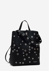 Black leather backpack with silver eyelet accents, zip closure, dual handles, and adjustable strap. Textured finish with logo detail.