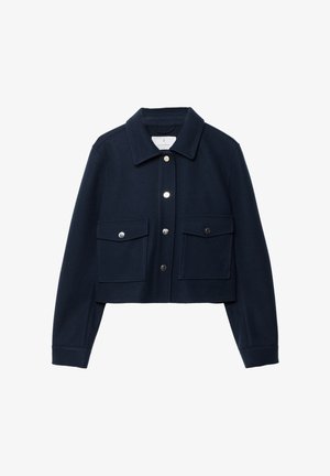 Navy cropped jacket made of wool blend, featuring a pointed collar, front snap buttons, and two chest pockets with flap closures.