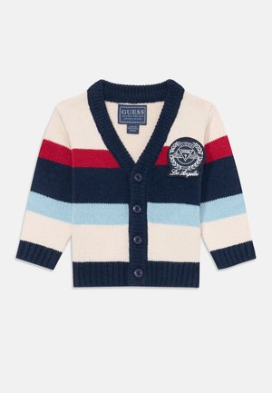 Marineblå, kremfarget og rødstripete strikket kardigan med V-hals, fem knapper og et sirkulært logo-patch på venstre bryst.