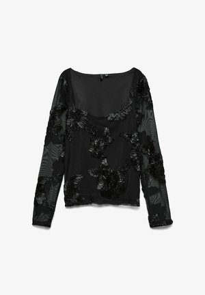 Top nero a maniche lunghe realizzato in tessuto trasparente, con applicazioni floreali in rilievo. Scollo rotondo, vestibilità leggermente ampia e maniche strutturate.