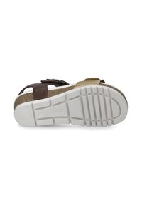 Braune Ledersandale mit verstellbaren Riemen, Korkfußbett und weißer Gummisohle, die über Rillen für besseren Halt verfügt. Markenlogo auf der Sohle sichtbar.