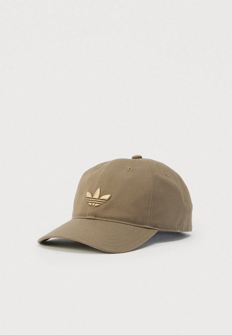 Light brown baseball cap with embroidered Adidas trefoil logo on front, displayed on plain white background.