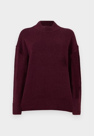 Jersey de punto burdeos con un alto cuello acanalado, hombros caídos y dobladillo acanalado. Hecho de un material suave y texturizado.