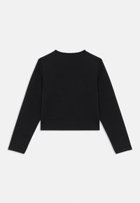 Svart langermet crop top laget av mykt stoff. Har rund hals og tettsittende ermer med et rent, sømløst design.