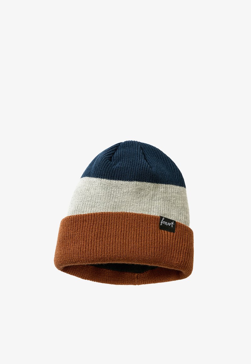 Bonnet tricoté avec trois blocs de couleur horizontaux : haut bleu marine, milieu gris clair et bord replié orange rouille avec une petite étiquette noire.