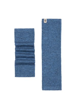 Blue knit arm warmers; one is textured with gathered design, the other is flat. Both feature a subtle pattern and a small logo tag.