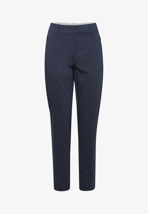 Tamsiai mėlynos kelnės su lygia tekstūra, pritaikytas siluetas, priekinių kišenių ir švarus dizainas. Juosmens srityje yra diržo kilpos.