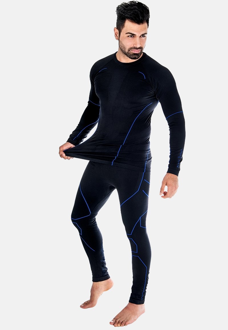 Schwarzes, sportliches Langarmshirt und Leggings mit blauen Akzenten und geometrischen Mustern, hergestellt aus einem dehnbaren, feuchtigkeitsableitenden Material.