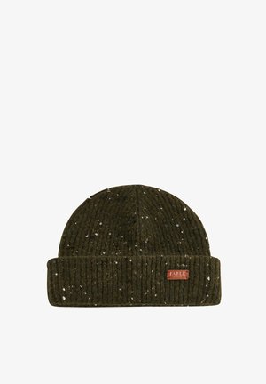 Pleteni zimski šešir tamno zelene boje s svijetlim točkicama, sa preklopljenim rebrastim rubom i malom pravokutnom oznakom s natpisom "TABLE." Mekani vunski materijal.