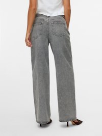 Grå vide jeans med høy midje, som har to baklommer og en rå kant. Laget av denim med en myk, lett teksturert finish.