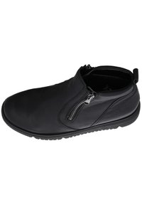 Schwarze Leder-Ankle-Boots mit glatter Oberfläche, seitlichem Reißverschluss und strukturiertem Gummisohle; minimalistische Nähte und eine leicht abgerundete Zehenpartie.