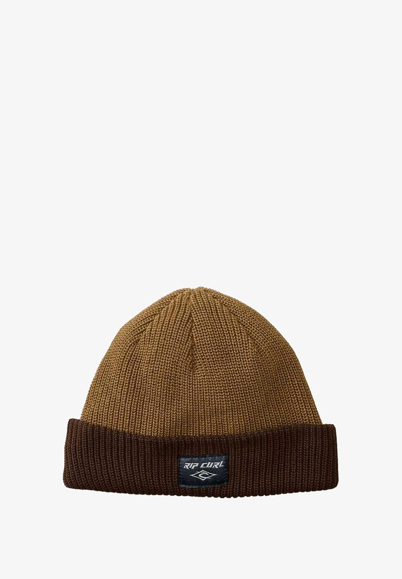 Bruine gebreide beanie met een ribbelstructuur, voorzien van een donkerbruine omgeslagen rand en een zwarte "Rip Curl" logopatch.