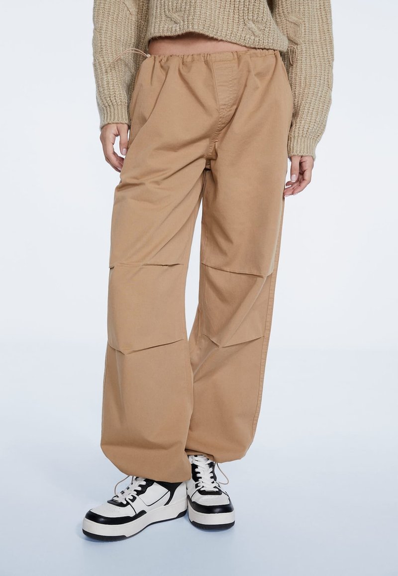 stradivarius parachute trousers
