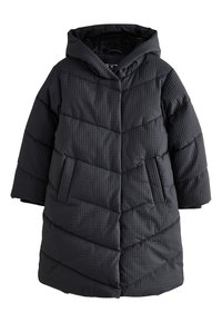 Manteau matelassé gris foncé avec capuche, présentant une surface texturée et matelassée, des poches latérales et un ourlet droit.