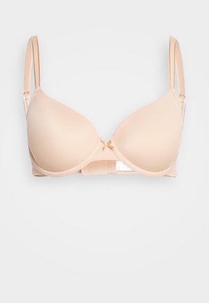 Beige padded bra with smooth fabric, adjustable straps, and a small bow accent at the center. Classic underwire shape and back closure.