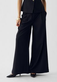 KAZIA - Stoffhose - black