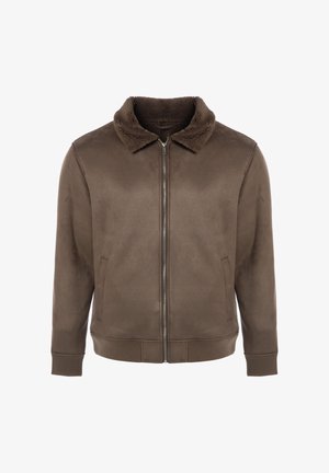 Pruun jakk pehme ja tekstuurse kraega, lukuga ja soonikkoes varrukaotstega. Varustatud küljetaskutega ja sileda välispinnaga.