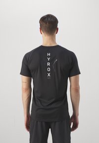 Puma HYROX FIT ULTRABREATHE TRIBLEND TEE - T-shirt de sport - black