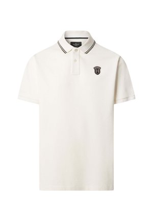 Poloshirt van off-white katoen met een zwarte streep op de kraag. Heeft een klein geborduurd embleem op de linkerborst. Korte mouwen.