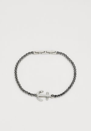 Sølv anker charm armbånd med en svart rhinestone-kjede, som har låsestengning og en glatt, polert overflate.