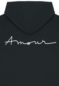 Black hoodie featuring a white, cursive "Amour" text prominently displayed on the back. Soft, cotton material with a classic shape.