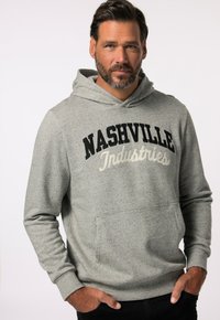 Felpa grigia realizzata in morbido tessuto, con una tasca a marsupio frontale. "NASHVILLE" è stampato in nero, con "Industries" in bianco sotto.