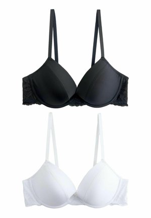 To polstrede bh'er med blonder på siderne, en sort og en hvid, vist fladt med justerbare skulderstropper mod en hvid baggrund.