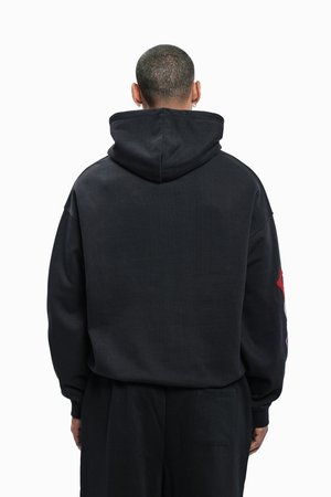 MULTIPATCH HOODIE UNISEX - Kapuutsiga pusa - black