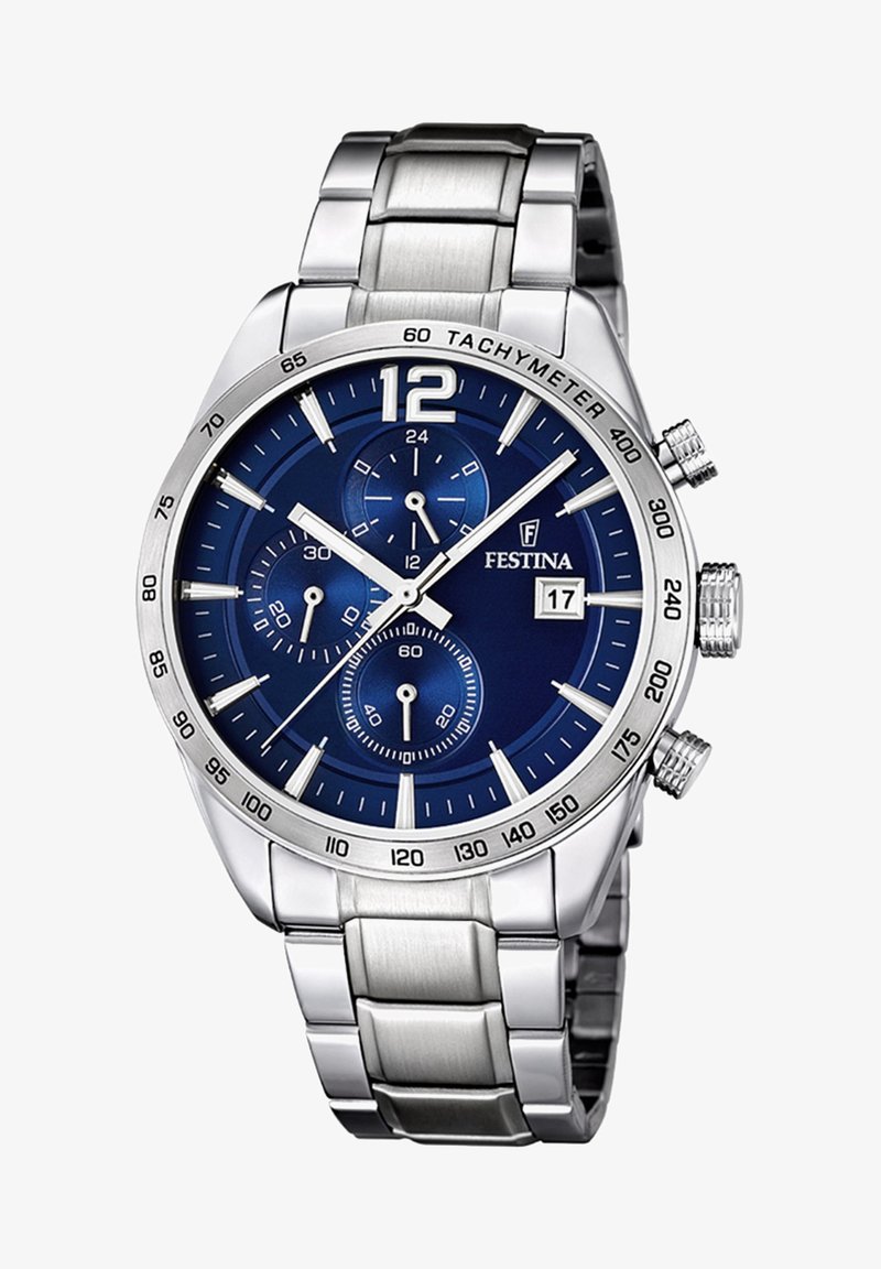 Urejen ura iz nerjavečega jekla z modrim izrezom, srebrnimi oznakami, funkcijo kronografa in prikazom datuma. Poudarjen tachymeter obroč.