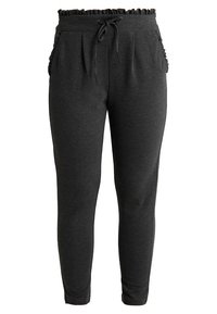 Kolsvart joggers med elastisk midja och volangkant, snörstängning och sidofickor, designade för komfort och enkelhet.