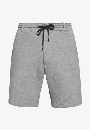 Sivé šortky z bavlnenej zmesi s elastickým pásom, nastaviteľnou čiernou šnúrkou a hladkým povrchom. Majú prehnuté lemy a voľný strih.