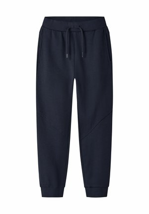 Pantalons de survêtement en coton bleu marine avec taille élastique, cordon de serrage, poches latérales, et jambes fuselées avec coutures diagonales et ourlets côtelés.