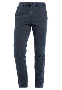 Marina bomullschinos med slim fit, knapstängning och sidfickor. Har en slät textur och en ren design utan dekorationer.