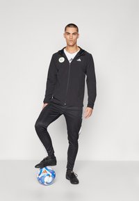 Veste Zippée BURRDA équipe Nationale Belge De Football - Taille M US, Manches Longues, Noir - Occasion Très Bon état