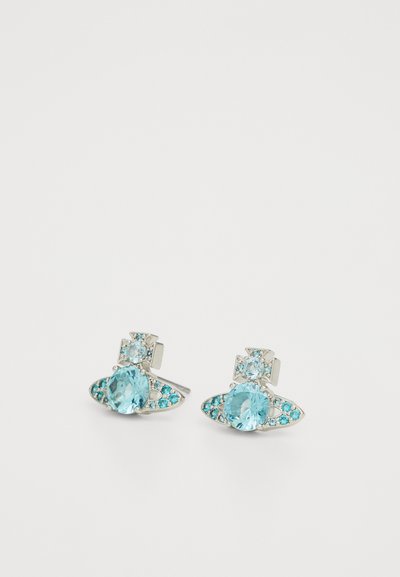 Silver stud earrings featuring light blue gemstones and turquoise accents, with an oval shape and decorative details around the stones.