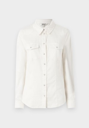 Camicia bianca a maniche lunghe con colletto, dotata di due tasche sul petto e chiusure con bottoni argentati. Realizzata in un tessuto morbido e leggero.