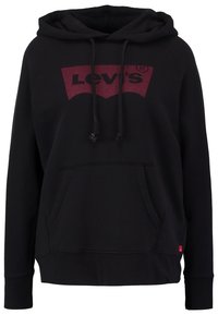 Sweat à capuche noir avec poche avant et cordons, présentant un logo Levi's rouge foncé sur la poitrine.