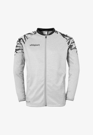 Veste zippée grise avec des accents noirs, arborant un motif géométrique sur les épaules et le logo "uhlsport" sur la poitrine gauche. Tissu doux.