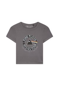 T-shirt grigia in cotone corto con il logo circolare dei Pink Floyd, un triangolo contornato e un accento arcobaleno, contrassegnato "Tour negli Stati Uniti 1973".