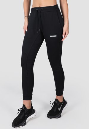 TERRY  - Pantalones deportivos - schwarz