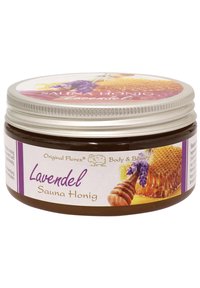 Braunes Glas mit Lavendel-Saunahonig und silbernem Schraubverschluss, versehen mit einem bunten Etikett, das Lavendelblüten und Wabenmuster zeigt.