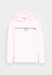 Felpa con cappuccio rosa in misto cotone. Presenta una stampa logo frontale con "TOMMY HILFIGER EST. 1985." Nastrini e polsini a costine.