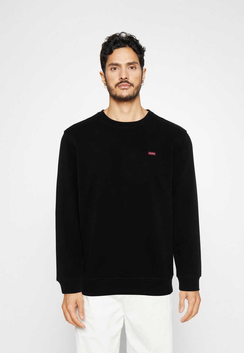 Guess LOGO PATCH Sweatshirt jet black/black Zalando