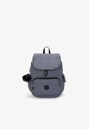 Navy blue backpack with geometric pattern, fabric material, flap closure, front pocket with zipper, and a fluffy pom-pom accent on the side.