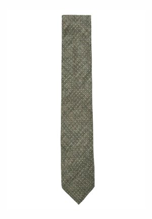 Cravate verte avec un motif texturé, arborant de petits points blancs sur un tissage diagonal, avec une pointe et un design étroit.