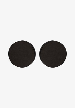 Round coasters in matte black, featuring a smooth surface with a slight texture, designed for stability and longevity. Suitable for various décor.