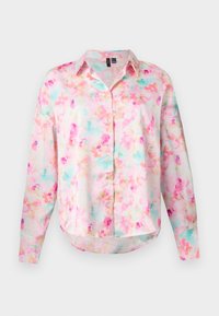 Camicia abbottonata in tessuto leggero, con un motivo floreale nei toni di rosa, blu e giallo. Maniche lunghe con orlo arrotondato.