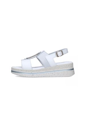 Sandali piattaforma bianchi con suola texturizzata e maculata, fibbia regolabile e dettagli in rete. Design aperto per traspirabilità e comfort.